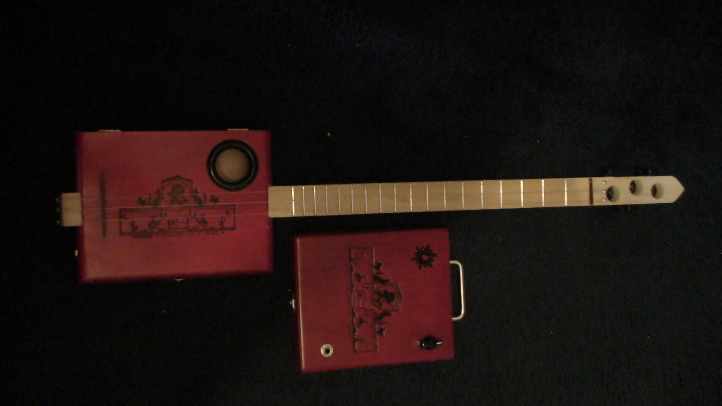 King's Cigar Box Guitar by Cipriano Vigil
